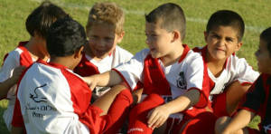 Israeli and Palestinian children meet for a soccer match sponsored by the Peres Center for Peace
