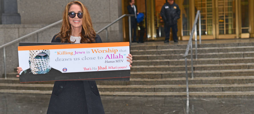 Pamela Geller holds the anti-Hamas ad.