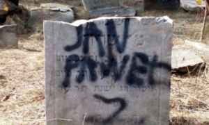 vandalized tombstone