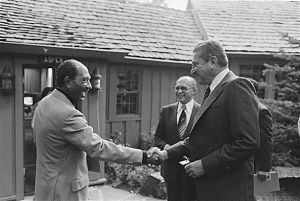 Egyptian President Anwar Sadat greets Israeli Foreign Minister Ezer Weizmann at Camp David.  (Wikemedia Commons)