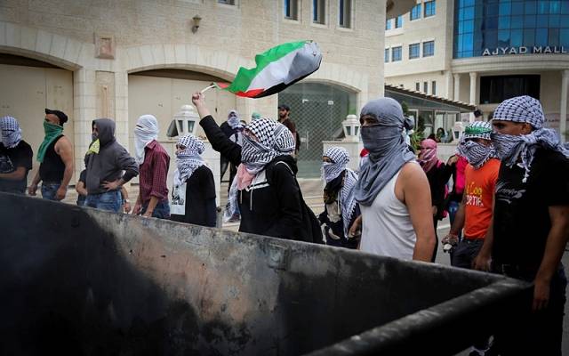 Palestinian rioters.