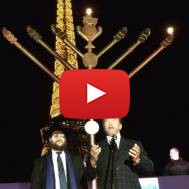Arnold Schwartzenegger Lights Chanukah Menorah in Paris