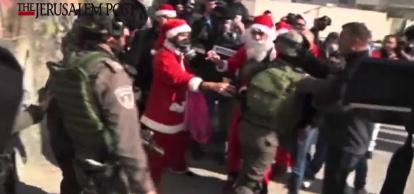 Palestinian Protesters Dress Like Santa Claus and Antagonize the IDF