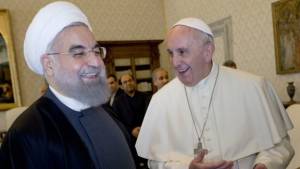 Iranian President Hassan Rouhani was welcomed by Pope Francis on Tuesday. (AP)
