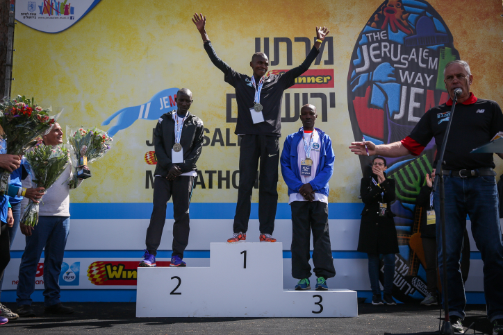 The award ceremony for the winners of the full marathon during the international Jerusalem Marathon. (Hadas Parush/Flash90)