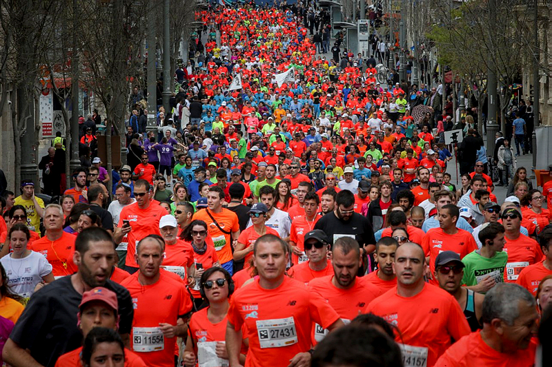 Some 30,000 runners participate in  the Jerusalem Marathon. (Yonatan Sindel/Flash90)